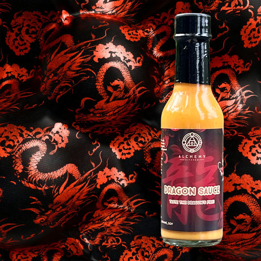 bottle of alchemy kitchen dragon sauce with traditional chinese background