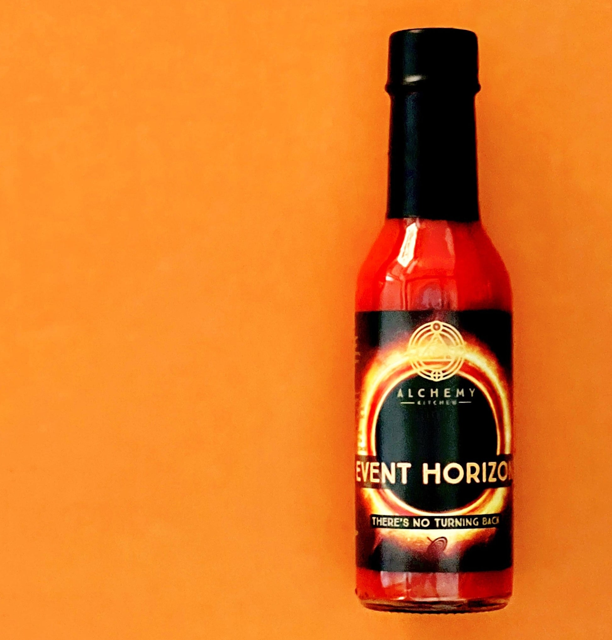Bottle of Alchemy Kitchen Event Horizon hot sauce