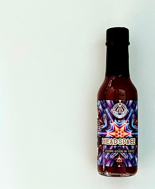 Bottle of Alchemy Kitchen Headspace hot sauce