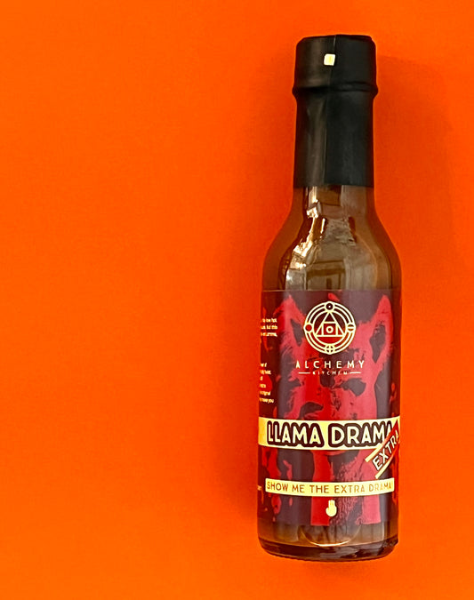 Bottle of Alchemy Kitchen Llama Drama Extra hot sauce